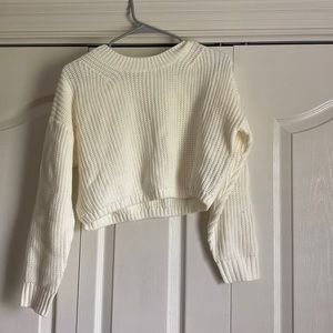 This cute off white sweater. Size medium